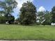 Landscaped lawn provides curb appeal and invites relaxation at 4282 By Pass, Loganville, GA 30052