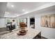 An expansive basement with an adjacent dining and living area, perfect for entertaining or relaxation at 4960 Norman Ct, Cumming, GA 30040
