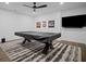 Finished basement featuring a covered pool table, offering a versatile space for recreation and leisure at 4960 Norman Ct, Cumming, GA 30040