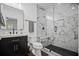 Modern bathroom featuring a glass-enclosed walk-in shower, sleek vanity, and contemporary fixtures at 4960 Norman Ct, Cumming, GA 30040
