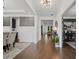 Inviting entryway with hardwood floors, modern lighting, and an open floor plan at 4960 Norman Ct, Cumming, GA 30040