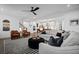 Spacious living room with contemporary decor, transitioning to kitchen and dining areas at 4960 Norman Ct, Cumming, GA 30040