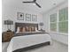Serene main bedroom with a large window and neutral decor at 4960 Norman Ct, Cumming, GA 30040