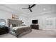 This is a bright and spacious main bedroom suite with trey ceilings and neutral colors at 4960 Norman Ct, Cumming, GA 30040