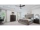 This is a spacious main bedroom suite with trey ceilings, neutral colors and en suite bath and walk-in closet at 4960 Norman Ct, Cumming, GA 30040