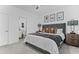 Comfortable main bedroom features soft lighting and ample natural light at 4960 Norman Ct, Cumming, GA 30040