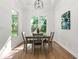 Cozy dining room with natural light and a table setting, perfect for Gathering meals at 8544 Plumtree Dr, Riverdale, GA 30274