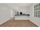 Bright kitchen with stainless steel appliances and breakfast bar at 2261 Star Mist Sw Dr, Atlanta, GA 30311