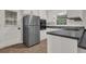 Bright kitchen featuring stainless steel appliances, white cabinets and countertop space at 2261 Star Mist Sw Dr, Atlanta, GA 30311