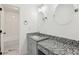 This bathroom has a granite counter top and single sink at 2725 Glendale Ne Dr, Conyers, GA 30013