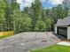 Large driveway with ample parking space and a spacious two car garage, perfect for Gathering and guests at 2725 Glendale Ne Dr, Conyers, GA 30013