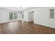 Spacious living room with hardwood floors, ample natural light, and classic interior features at 2725 Glendale Ne Dr, Conyers, GA 30013