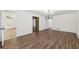 Open-concept living room with hardwood floors, recessed lighting, and easy access to other rooms at 2725 Glendale Ne Dr, Conyers, GA 30013
