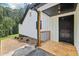 The home's side entrance features a wood deck and a landscaped area at 2725 Glendale Ne Dr, Conyers, GA 30013