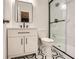 Nicely appointed bathroom with glass shower door, modern vanity, and attractive tile at 290 Bromack Se Dr, Atlanta, GA 30315