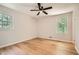 Well lit bedroom with windows on two walls and a ceiling fan at 290 Bromack Se Dr, Atlanta, GA 30315