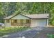 Charming brick home with inviting front porch and well-manicured lawn at 290 Bromack Se Dr, Atlanta, GA 30315