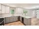 Open kitchen featuring an island with seating and stainless steel appliances at 290 Bromack Se Dr, Atlanta, GA 30315