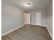 This bedroom offers neutral walls, recessed lighting, and stylish and modern flooring at 1232 Pinedale Nw Cir, Conyers, GA 30012