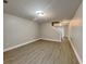 Spacious living room features hardwood floors, recessed lighting, and access to the backyard at 1232 Pinedale Nw Cir, Conyers, GA 30012