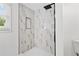 Modern bathroom with stylish tile shower, sleek fixtures, and ample natural light, creating a spa-like experience at 1780 Penn Camp Road, Douglasville, GA 30134