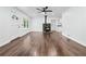 Inviting living room with hardwood floors, a cozy fireplace, and an abundance of natural light at 1780 Penn Camp Road, Douglasville, GA 30134