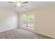 Comfortable bedroom featuring neutral paint and ceiling fan at 2727 Parkway Trl, Lithonia, GA 30058