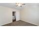 Bedroom with ceiling fan and access to hallway at 2727 Parkway Trl, Lithonia, GA 30058