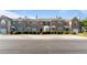Attractive townhome complex with well-maintained landscaping and convenient parking at 2727 Parkway Trl, Lithonia, GA 30058