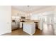 Modern kitchen with stainless steel appliances, granite countertops, and a central island at 2727 Parkway Trl, Lithonia, GA 30058