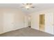 Spacious main bedroom with dual closets and a doorway to the ensuite bathroom at 2727 Parkway Trl, Lithonia, GA 30058