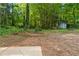 View of backyard featuring lawn and what appears to be a storage shed at 2984 E Paulding Dr, Dallas, GA 30157