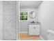 Bathroom features a shower with marble tiling and modern fixtures at 2984 E Paulding Dr, Dallas, GA 30157