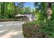 Front exterior of home featuring large carport and lawn at 2984 E Paulding Dr, Dallas, GA 30157