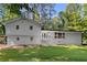 Charming two-story white home with a beautifully manicured lawn and inviting front entrance at 2984 E Paulding Dr, Dallas, GA 30157