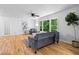 Spacious living room featuring hardwood floors, backyard view, and neutral decor at 2984 E Paulding Dr, Dallas, GA 30157