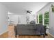 Open living room with hardwood floors, neutral decor, and backyard view at 2984 E Paulding Dr, Dallas, GA 30157