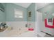 Relaxing bathroom with a large soaking tub, neutral tones, and decorative accents at 7376 Bates Dr, Cumming, GA 30040