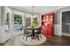 Charming dining area with bright windows and classic decor at 7376 Bates Dr, Cumming, GA 30040