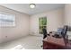 This office features hardwood floors and a large window providing natural light at 8415 Ridge Rd, Fairburn, GA 30213