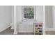Inviting bathroom with soaking tub and a separate walk-in shower at 985 Laurel Springs Ln, Marietta, GA 30064
