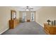 Large bedroom with neutral walls, carpet floors, and natural light at 985 Laurel Springs Ln, Marietta, GA 30064