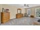 Spacious bedroom with neutral walls, carpet floors, and two sunny windows at 985 Laurel Springs Ln, Marietta, GA 30064