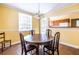 Dining room featuring hardwood flooring and natural light at 1268 Thomas Rd, Decatur, GA 30030