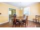 Dining room with decorative lighting and hardwood flooring at 1268 Thomas Rd, Decatur, GA 30030