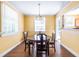 Cozy dining room with classic wooden table and chairs and bright natural light at 1268 Thomas Rd, Decatur, GA 30030