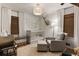 Well appointed Bedroom with grey crib, decorative wall design and natural light at 2164 Medfield Trl, Atlanta, GA 30345
