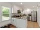 Updated kitchen with stainless appliances, granite countertops, and white cabinetry at 2164 Medfield Trl, Atlanta, GA 30345