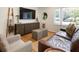 Comfortable living room featuring hardwood floors, modern decor, and ample seating at 2164 Medfield Trl, Atlanta, GA 30345
