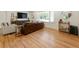Bright living room with hardwood floors, stylish seating, and a comfortable atmosphere at 2164 Medfield Trl, Atlanta, GA 30345